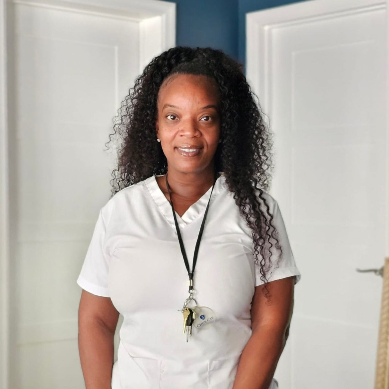 Ernestine, Chub Cay's new full-time massage therapist, smiling in the spa
