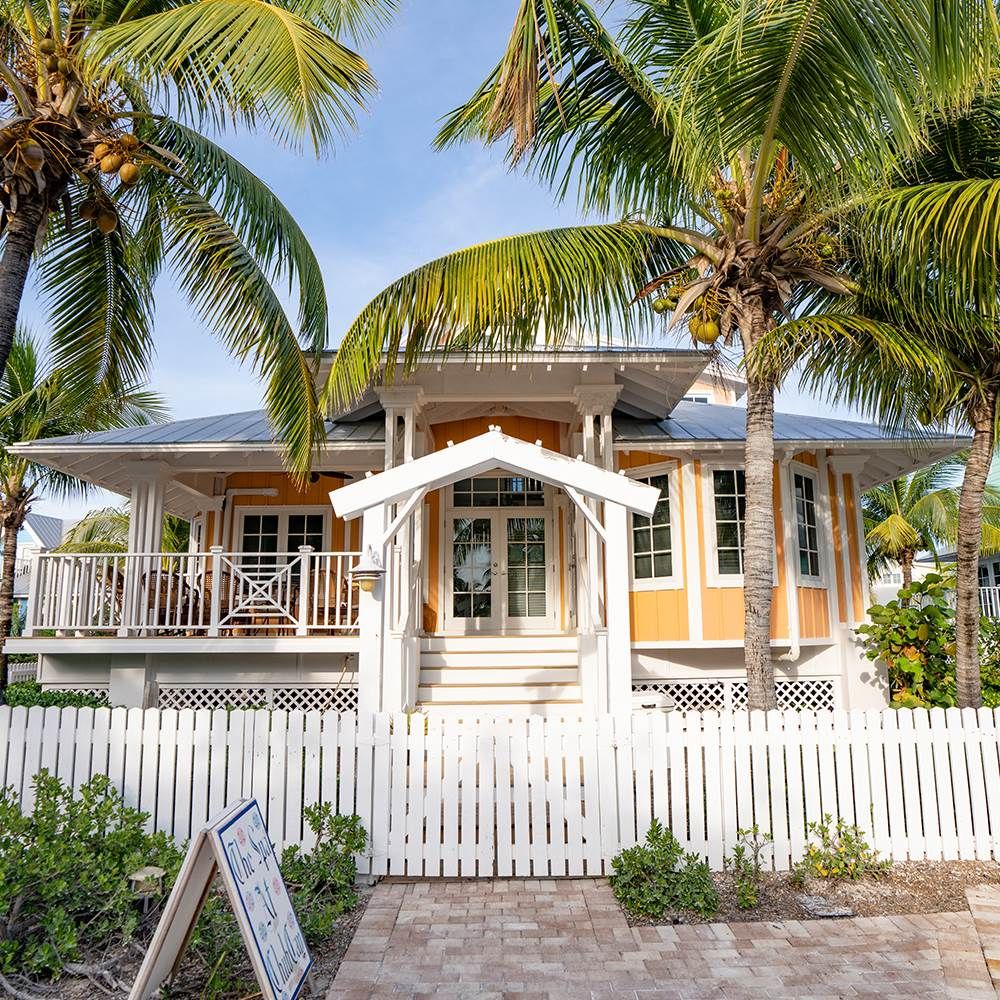 The Spa at Chub Cay cottage behind its white picket fence